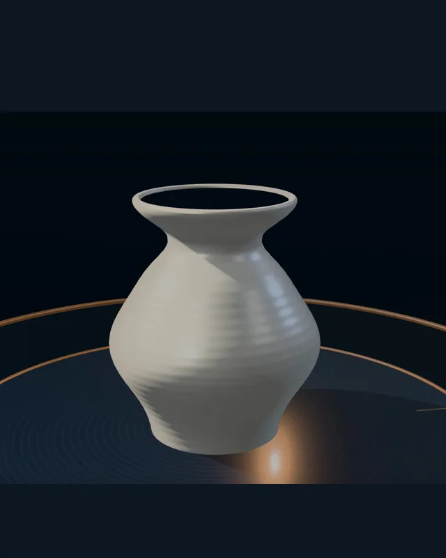 A finished ceramic vessel holds steady on a potter’s wheel